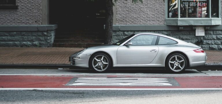 All German Auto Porsche in Escondido, CA. Image of a silver Porsche car.