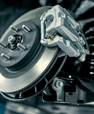 Image of a disc brake from All German Auto illustrating how often brakes need replacing on German cars.
